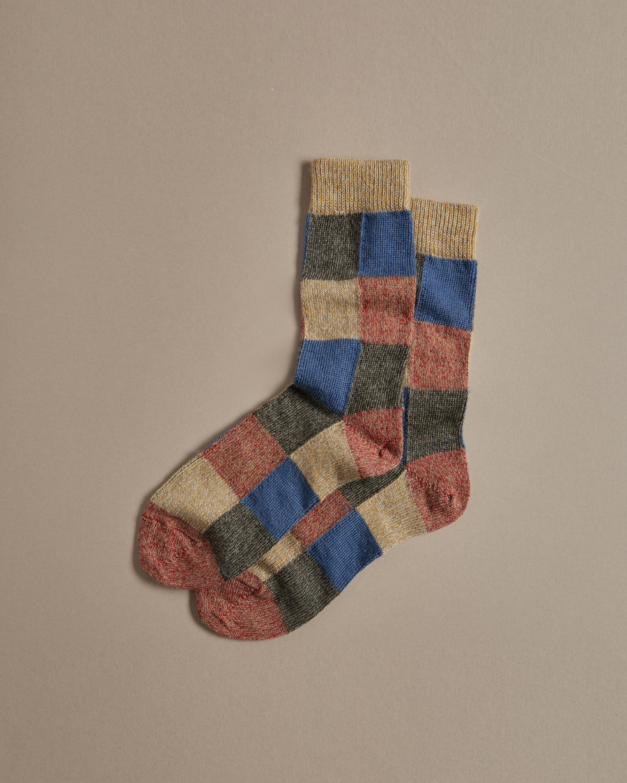 Patchwork merino wool socks in blue red and yellow, made in UK