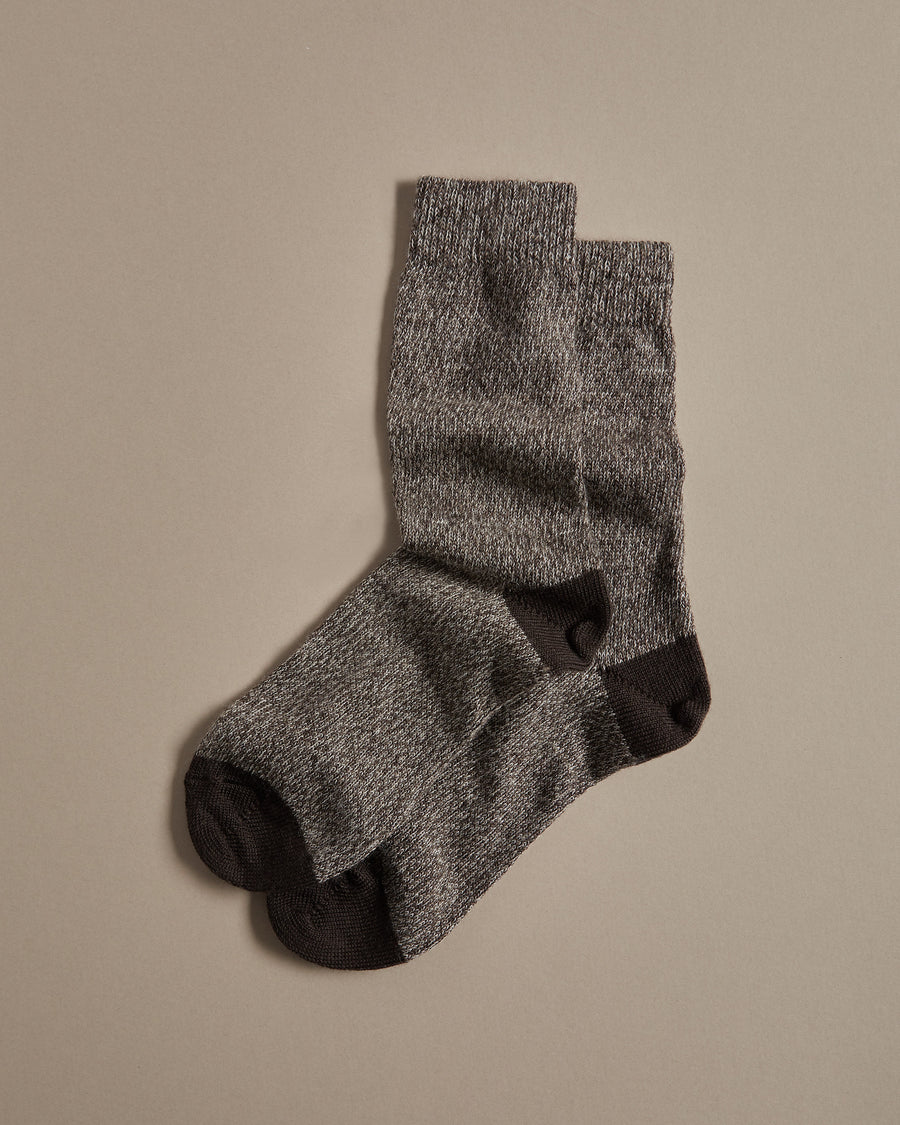 Pair of merino wool socks with brown toes and heels